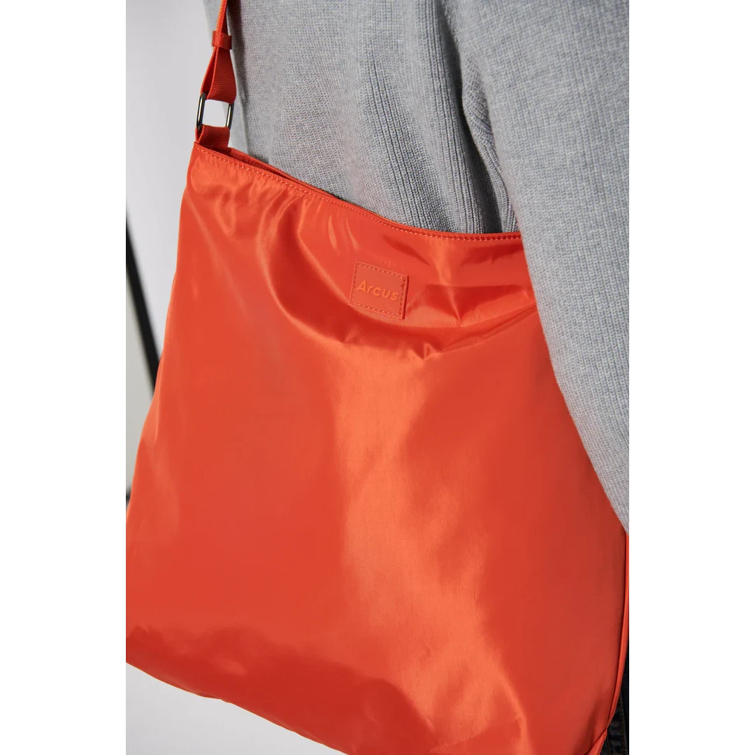 Arcus orange crossbody tote