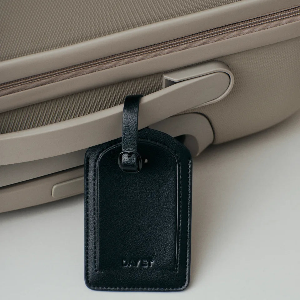 day sort kuffertmærke