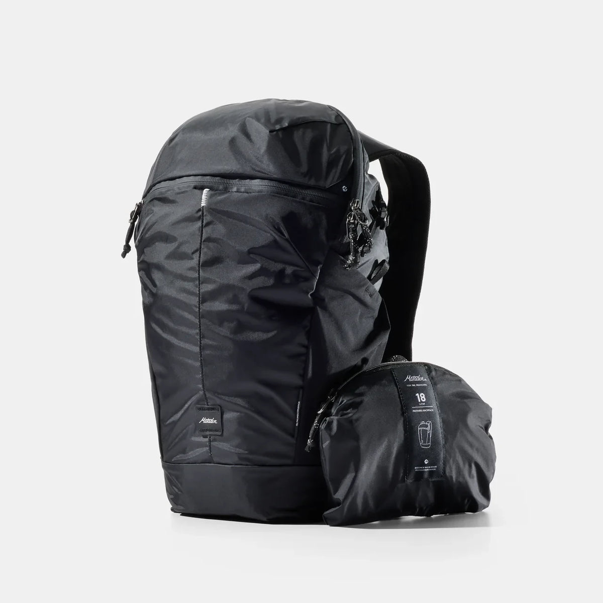 Matador 18L sort packable Daypack, forfra og sammenfoldet