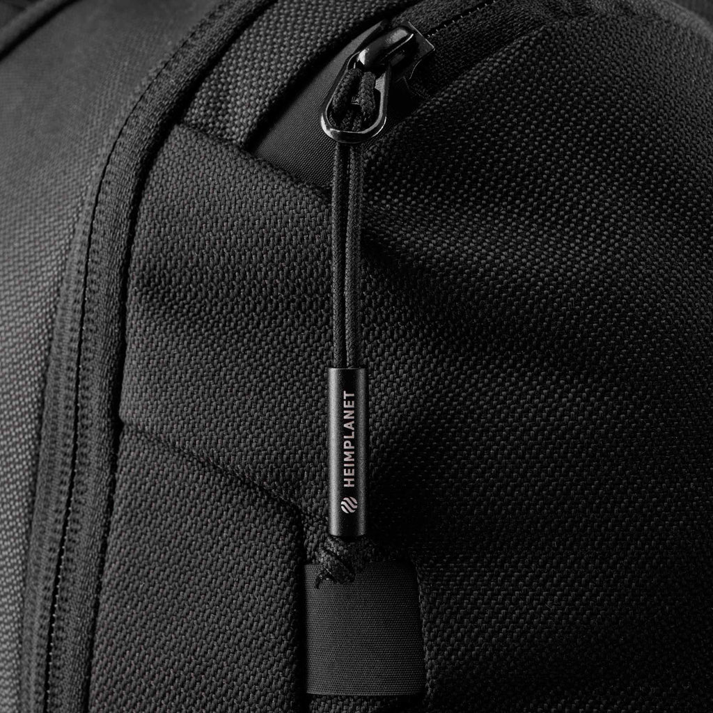 Heimplanet 34 liter rejserygsæk sort, metaldrager, lynlås