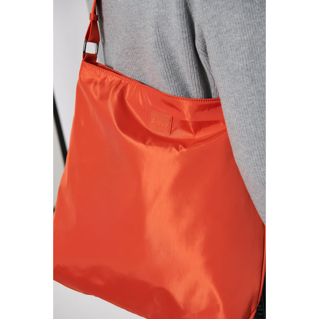 Arcus orange crossbody tote