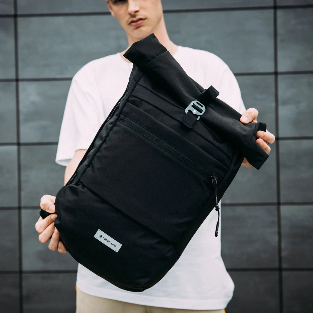 model med Heimplanet Carry Essentials Sort Rygsæk